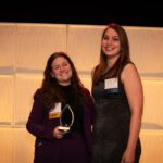 Shayna Earle receives the 2023 Women of Distinction Award in the Young Trailblazers Category from Award Sponsor, Fusion Pharmaceuticals.